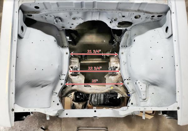 engine_bay_w_dimensions_dotted_lines_indicate_area_requiring_modification.jpg