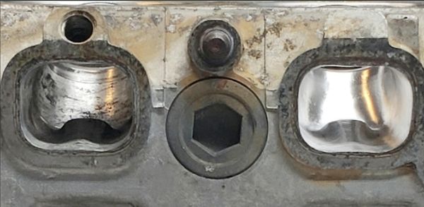 exhaust_compare_1_done_2_not_yet_touched.jpg
